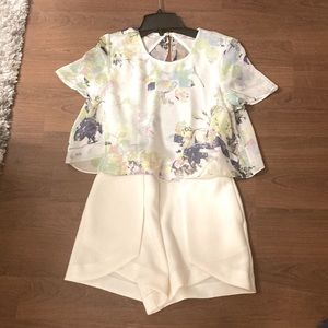 Beautiful dress jumpsuit designed by the brand BCBG Generation.